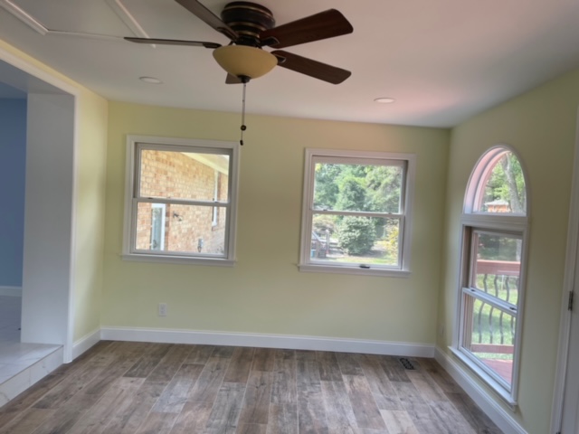 image Sun room with electric fire place sunrise step into kichen onley MD